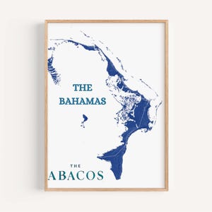 May include: A blue and white map print of The Bahamas with the text "The Bahamas" and "The Abacos" in a teal blue font.