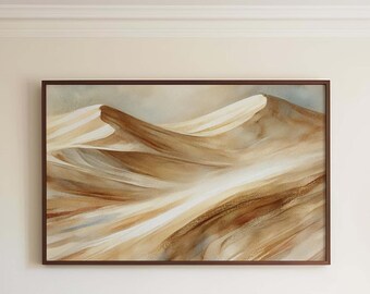 May include: A framed watercolor painting of a desert landscape with sand dunes in shades of brown, beige, and white.