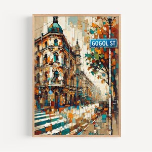 May include: A framed art print depicting a street scene with a building on the corner. The building is painted in shades of orange, brown, and blue. A street sign reads "GOGOL ST". The artwork has a mosaic style.