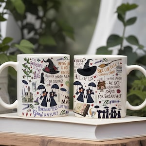 May include: Two white ceramic mugs featuring colorful illustrations of witches, black cats, umbrellas, and spellbooks. The text includes phrases like 'The Belladonna is in my bag', 'There's a little witch in all of us', and 'In this house we eat chocolate cake for breakfast'.