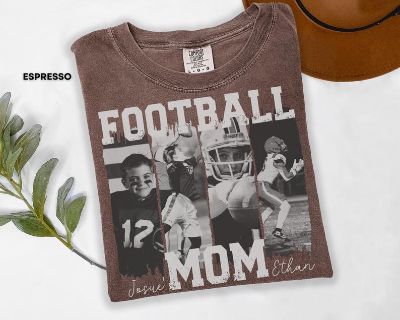 May include: Espresso-colored t-shirt with a distressed graphic. The design features the word "FOOTBALL" above a collage of football player images. Below the images, the text reads "MOM" and a name. The shirt is a Comfort Colors brand.