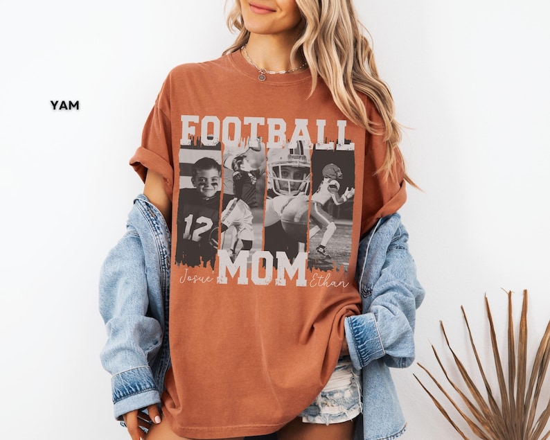 May include: A burnt orange t-shirt with the words "FOOTBALL MOM" in white block letters. The shirt features four black and white images of football players. The names "Jessee" and "Ethan" are printed below the word "MOM".