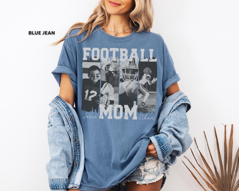 May include: Blue jean-colored t-shirt with the words "FOOTBALL MOM" in white block letters. The shirt features a collage of four black and white images of football players. The names "Jesie" and "Ethan" are printed below the word "MOM".