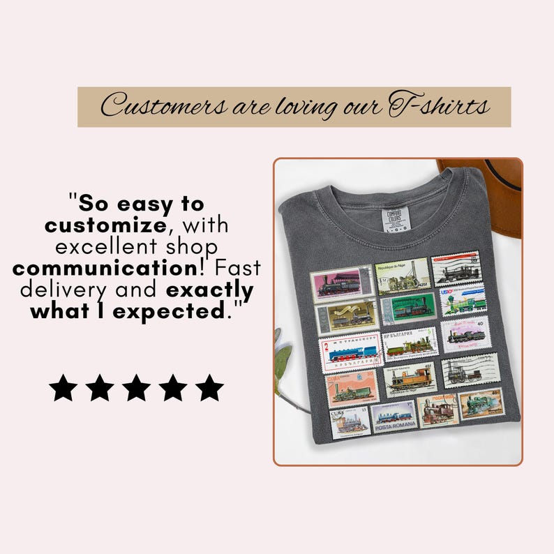 May include: A gray t-shirt featuring a collection of vintage postage stamps with train illustrations. The shirt has a crew neck and short sleeves. Text on the image reads "Customers are loving our T-shirts" and a customer review.