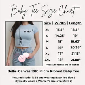 May include: A baby tee size chart with measurements in inches. The chart includes sizes XS to 2XL, with width and length measurements. The image shows a light blue baby tee on a model, with the text "Baby Tee Size Chart". The shirt is Bella+Canvas 1010 Micro Ribbed.