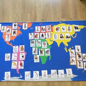 Montessori Tierlernset mit Weltkarte, entdecken Sie 7 Kontinente, ihre Wildnis! Set mit Audio & Stoff Weltkarte, Interaktive Karten