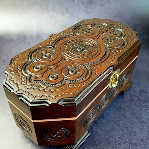 Carved Walnut Jewelry Box: Handmade Wooden Casket