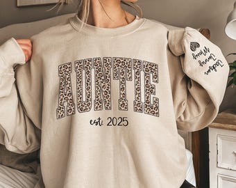 Custom Leopard Auntie Sweatshirt With Kid Name On Sleeve, Personalized Auntie Sweatshirt Gift For Auntie, Christmas Gift Auntie Est 2025 Tee