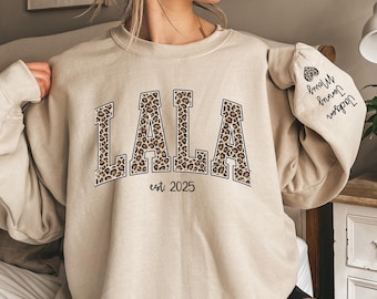 Custom Leopard Lala Sweatshirt With Kid Name On Sleeve, Personalized Lala Sweatshirt, Gift For Lala, Christmas Gift Lala Est 2025 Sweatshirt