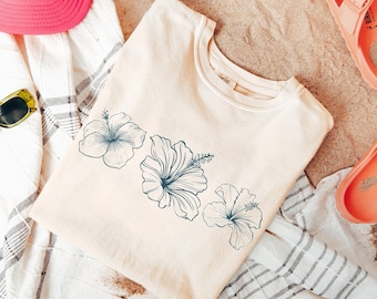 Chemise à fleurs d'hibiscus Comfort Colors®, chemise à fleurs tropicales, t-shirt de plage pour les vacances à Hawaï, chemise ambiance estivale pour femme, style bohème surdimensionné