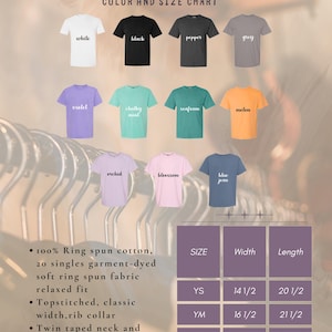 May include: A size chart for youth t-shirts in various colors, including white, black, pepper, grey, violet, chalky mint, seafoam, melon, orchid, blossom, and blue jean. The chart shows the width and length measurements in inches for sizes YS, YM, YL, and YXL.