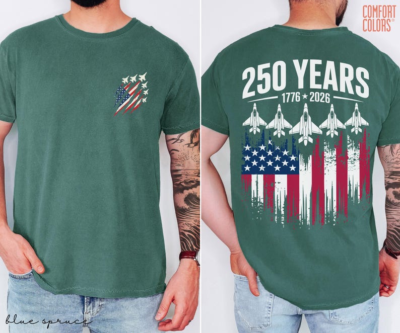 May include: A dark green t-shirt featuring a small graphic on the front left chest of fighter jets over a distressed American flag. The back displays the text 250 YEARS 1776-2026 above five fighter jets and a large distressed American flag graphic.