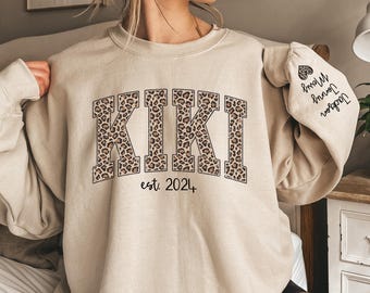 Custom Leopard Kiki Sweatshirt With Kid Name On Sleeve, Personalized Kiki Sweatshirt, Gift For Kiki, Christmas Gift Kiki Est Shirt