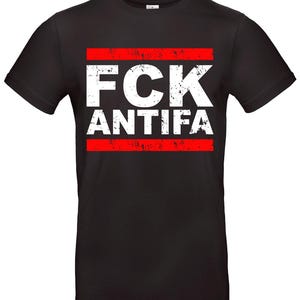 May include: Black t-shirt with white text that says "FCK ANTIFA" in a distressed font. The text is framed by two red horizontal lines.
