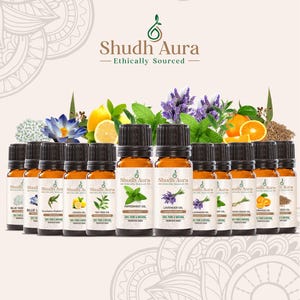 May include: A collection of 12 amber glass bottles with black caps, each containing a different essential oil. The bottles are labeled with the name of the oil, "Shudh Aura", and "Ethically Sourced".