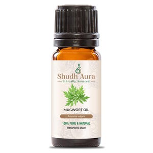 May include: A brown glass bottle with a black cap, labeled "Shudh Aura Ethically Sourced Mugwort Oil Artemisia vulgaris 100% PURE & NATURAL THERAPEUTIC GRADE".