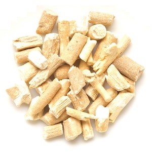 May include: A collection of small, dried, light beige woody root segments with a fibrous, uneven texture. The pieces are cylindrical and irregular in shape, displaying a natural, matte finish with varying shades of tan and cream throughout the pile.