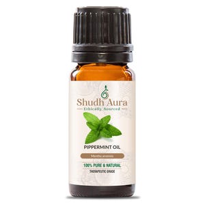 May include: A brown glass bottle with a black cap, labelled "Shudh Aura Ethically Sourced Peppermint Oil Mentha arvensis 100% Pure & Natural Therapeutic Grade". The label features a green leaf design.