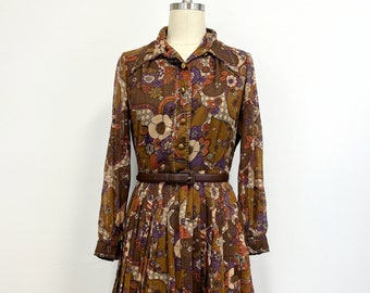 Vintage bloemen shirtwaist jurk | Pretaporte-jurk met lange mouwen uit de jaren 60 | Bruin en Paars | Maat medium tot groot