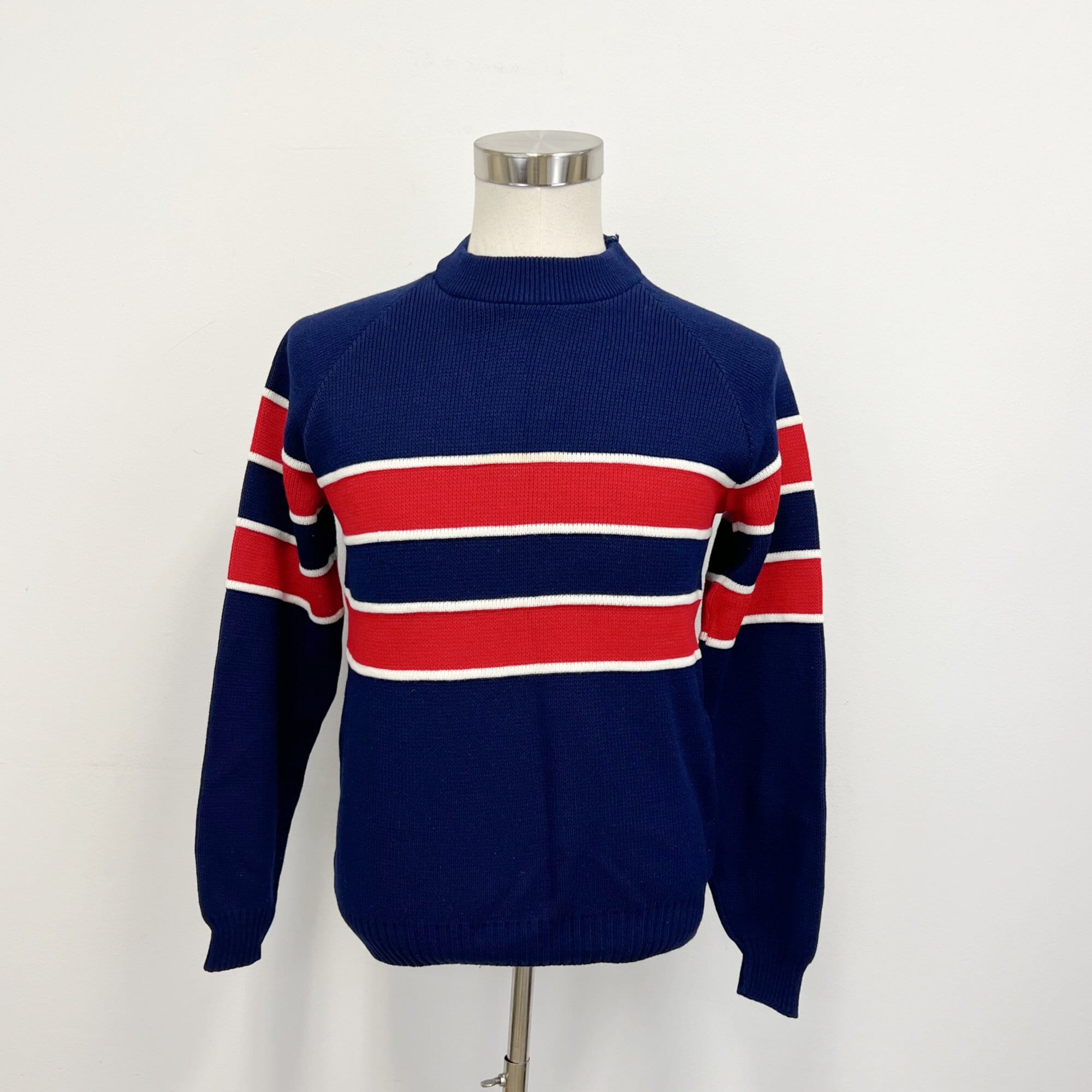 Red white shop and blue pullover
