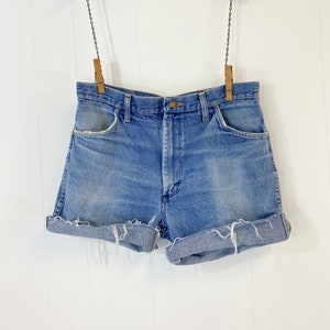 Cortes jeans vintage | Shorts Rustler Jean dos anos 70 | Desbotado e desgastado | 32 cintura