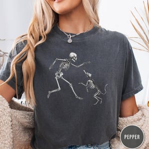 Skeleton Playing Fetch with Dog T-Shirt - Funny Halloween Tee - Best Bone Buds Shirt - Spooky Pet Lover Gift