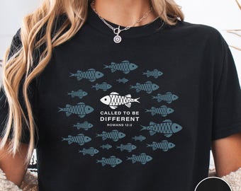 Camiseta «Llamados a ser diferentes»: Camiseta unisex con estampado de peces.