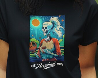 May include: Black t-shirt featuring a colourful graphic of a skeleton woman holding a baseball glove and a cup of coffee. The text "The Baseball Mom" is printed below the graphic.