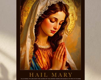 May include: A framed print featuring a religious illustration of Mary, with a halo and a white veil. She is depicted with her hands clasped in prayer, wearing a gold and blue garment. The text "HAIL MARY" is at the bottom, with a prayer below.
