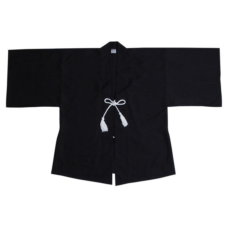 May include: A black Japanese-style jacket with white cords and tassels. The jacket is open at the front and has long sleeves.