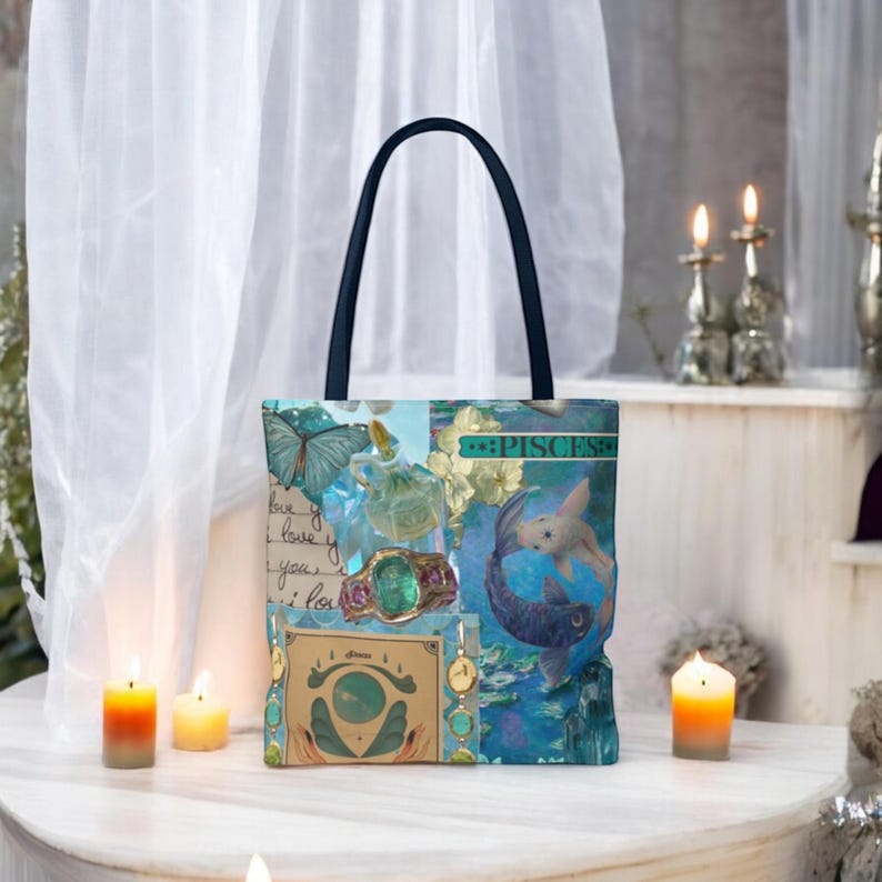 May include: A tote bag with a black handle and a collage design. The collage features a butterfly, perfume bottles, a ring, and the word "PISCES". The color scheme is primarily blue and teal, with accents of gold and cream.