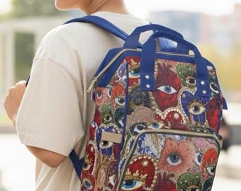 Mochila de protección con diseño de ojo malvado, bolsa de viaje escolar espiritual, estilo bohemio y brujería, mochila colorida con diseño de ojo de diablo místico para uso diario.