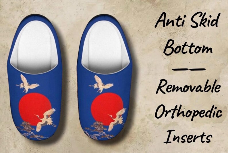 May include: A pair of blue slippers with a red sun and crane design. The slippers have white interiors and feature the text "Anti Skid Bottom, Removable Orthopedic Inserts."