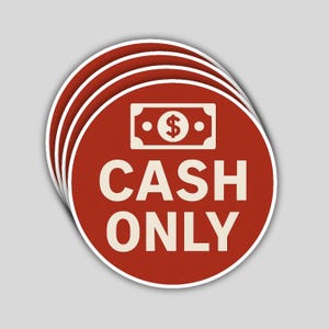 May include: A stack of red circular stickers with a white border. Each sticker has the words "CASH ONLY" in large, off-white letters. Above the text is a white graphic of a dollar bill symbol.