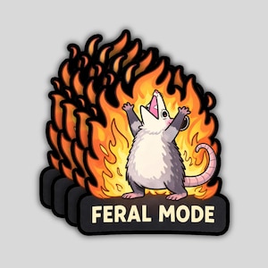 May include: A sticker pack featuring a cartoon opossum with its arms raised, surrounded by flames. The opossum is gray and white, with a pink mouth. The text "FERAL MODE" is below the opossum.