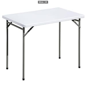 May include: A white, rectangular folding table with a metal frame. The table is 3 feet long and has a simple, clean design. The legs are gray and fold for easy storage.
