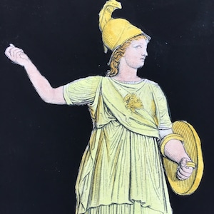 May include: A hand-drawn illustration of a woman wearing a yellow helmet and a yellow tunic with a lion's head design. She is holding a shield in her right hand.