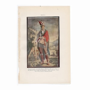 May include: A watercolor painting of a Native American man in traditional clothing. He is wearing a red and white feathered headdress, a red and white blanket, and a white and brown shirt. He is holding a spear in his right hand and a shield in his left hand. The painting is set against a backdrop of trees and mountains. The text "Thayendanegea, or Joseph Brant, Mohawk chief and colonel in the British Army during the Revolution. Artist unknown. Courtesy of Mr. David I. Bushnell, Junior" is printed below the painting.