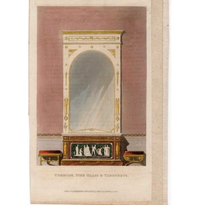 May include: A white and gold painted antique commode with a large mirror, a green marble top, and two matching side tables. The commode features a decorative design with a central arch and a carved floral motif. The mirror is framed in a white and gold painted frame with a decorative design. The side tables are also painted white and gold and feature a green marble top. The commode is set against a pink background.