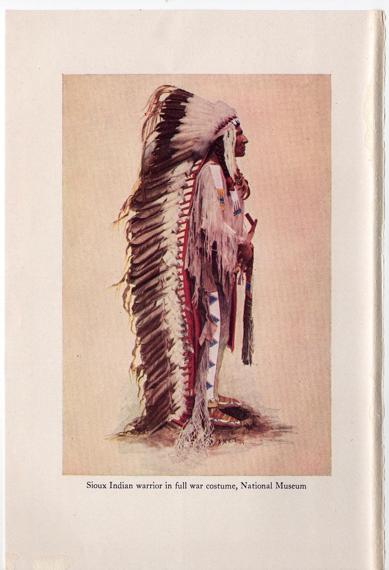 May include: Illustration of a Sioux Indian warrior in full war costume, seen in profile. The warrior is wearing a large feathered headdress, a fringed tunic, and leggings. The text at the bottom reads: Sioux Indian warrior in full war costume, National Museum.