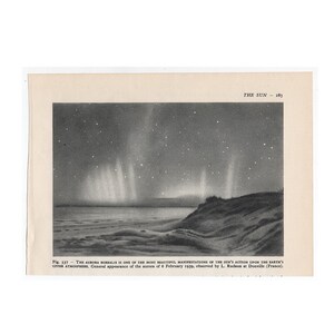 May include: A black and white illustration of the aurora borealis, also known as the Northern Lights, over a landscape. The image is from a vintage book and includes the text "THE SUN - 283" and a caption describing the aurora.