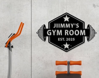 May include: Black metal sign with the text "JIMMY'S GYM ROOM EST. 2025" and a dumbbell design. An exercise machine with orange accents is visible on the left, and a weight bench with orange handles is at the bottom.