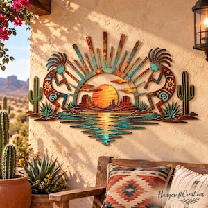 May include: A metal wall art piece featuring two Kokopelli figures playing flutes on either side of a central sun rising over a desert landscape with cacti. The design incorporates rust-colored and turquoise patina finishes with sun rays.
