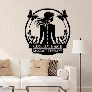 May include: Black and white silhouette of a woman with butterflies and floral accents. The text "CUSTOM NAME MASSAGE THERAPY" is displayed below the silhouette.