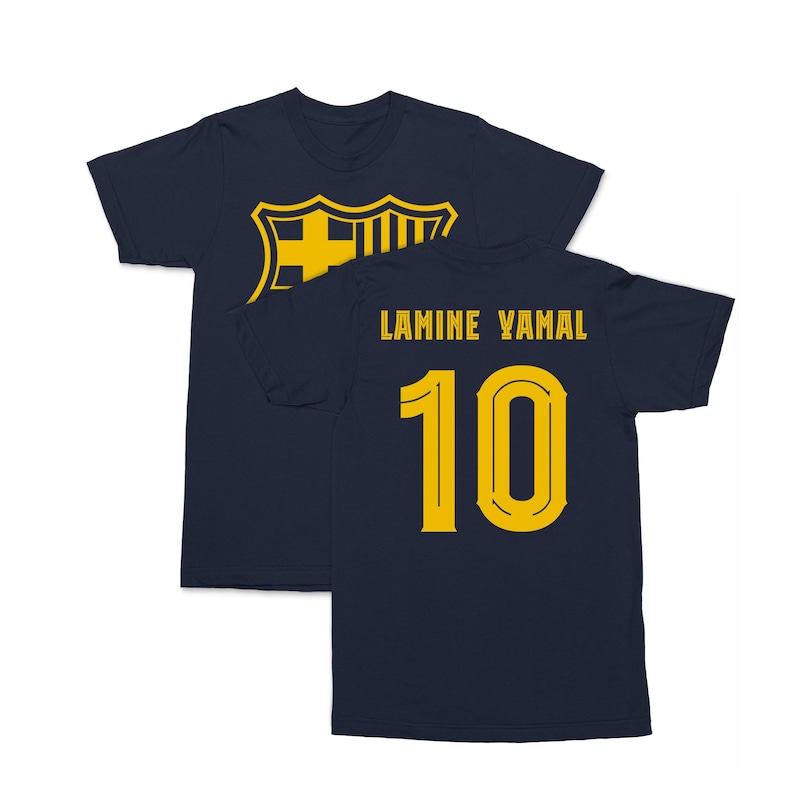 A navy blue t-shirt with a yellow soccer club crest and the name "LAMINE YAMAL" printed on it, along with the number "10".