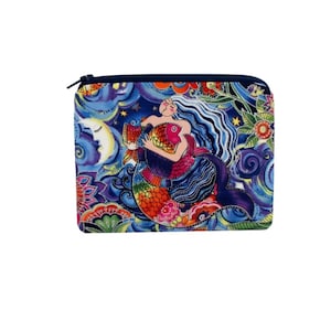 May include: A rectangular, zippered pouch featuring a colorful illustration of a mermaid embracing a fish. The design includes a crescent moon, stars, and floral patterns in shades of blue, purple, orange, and red. The zipper is navy blue.