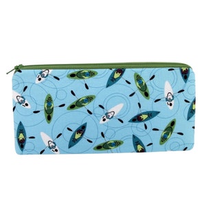 May include: A light blue zippered pouch with a repeating pattern of green and white kayaks on a blue background.