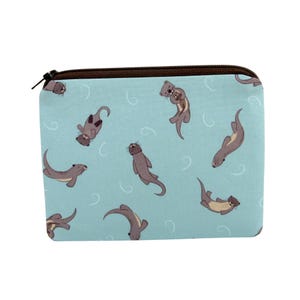 May include: A light blue zippered pouch with a repeating pattern of brown otters swimming in a light blue background.