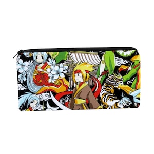 May include: A black zippered pencil case with a colorful anime-style print featuring characters, a tiger, and a pagoda. The print includes red, yellow, green, blue, and white colors.