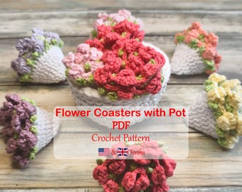 May include: Crochet pattern for flower coasters with pot, featuring five crocheted flower arrangements in pink, purple, yellow, and red. The pattern is available in both US and UK terms.